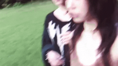 Two Women Standing On Green Field GIF