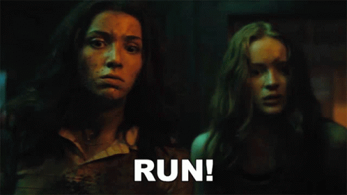 Two Women Standing One Screaming Run