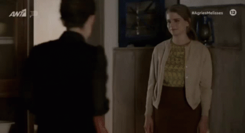 Two Women Standing Saying Agriesmelisses