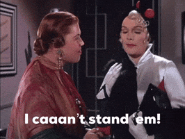Two Women Standing Together Saying I Caaan't Stand Em