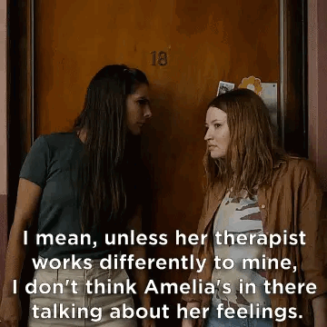 Two Women Talking by Door
