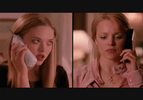 Two Women Talking on Cell Phones