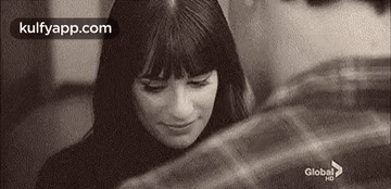 Two Women Touching Faces At Night GIF