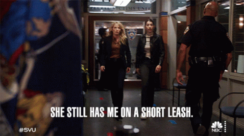 Two Women Walking Down Hallway She Still Has Me On A Short Leash GIF