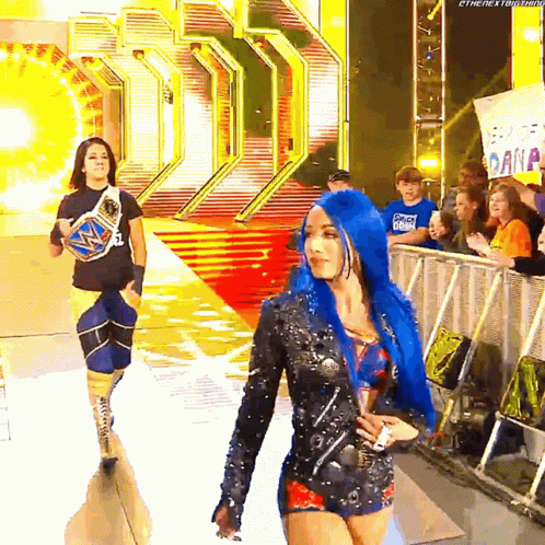 Two Women With Blue Hair Walking Red Carpet Sign The Next Thing