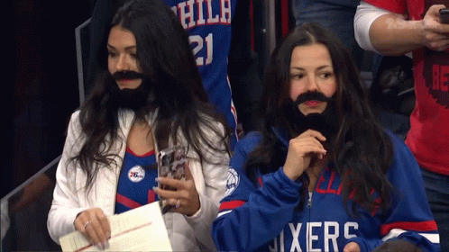 Two Women with Fake Beards at 76ers Stadium