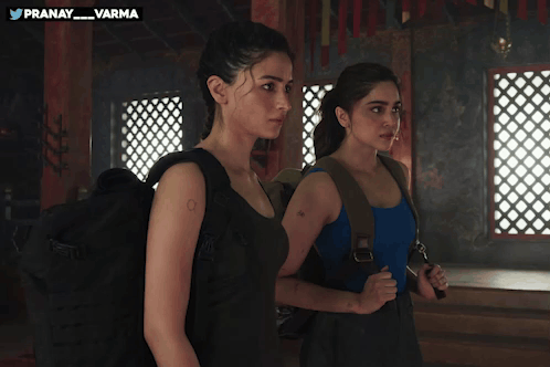 Two Women With Pranay Varma Watermark GIF