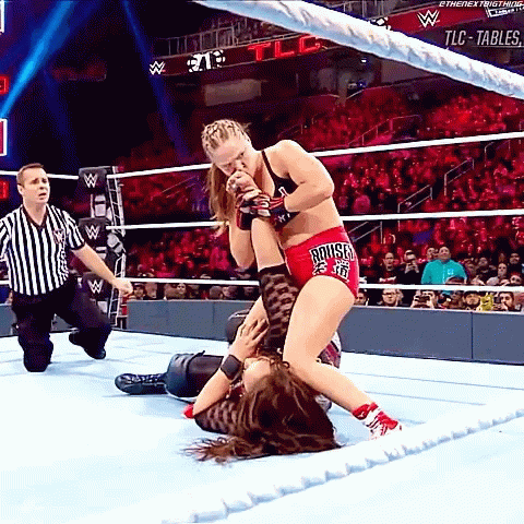Two Women Wrestling in Ring