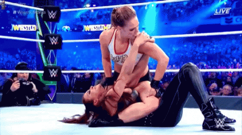 Two Women Wrestling in Ring