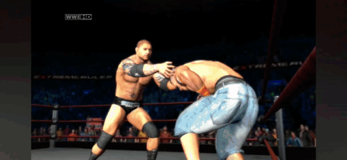 Two Wrestlers Are Fighting In A Ring With Wwe Hd On The Bottom Right GIF