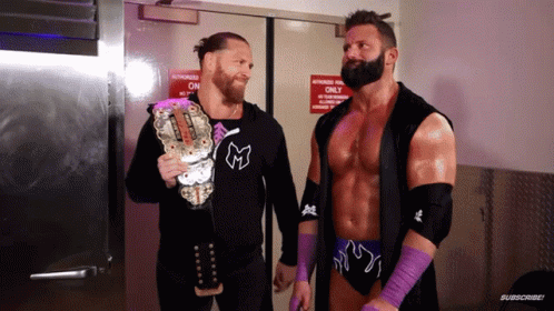 Two Wrestlers Are Standing In Front Of A Door That Says Authorized Only On It GIF