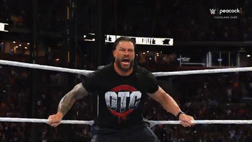 Two Wrestlers In A Ring With The Word Prime On The Ring GIF