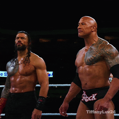 Two Wrestlers in Ring One Wearing Rock Shorts