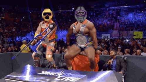 Two Wrestlers On Smackdown Live Stage GIF