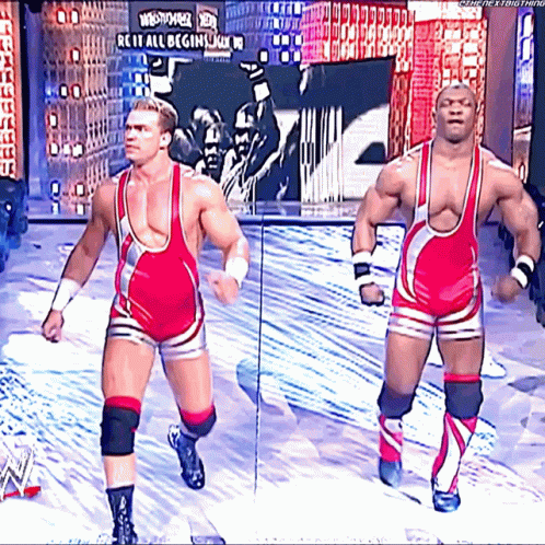 Two Wrestlers Stage We Are All Begining