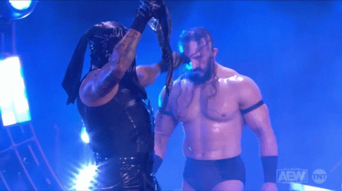 Two Wrestlers With AEW Logo