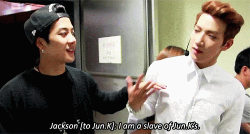 Two Young Men Are Standing Next To Each Other And One Of Them Says " Jackson " GIF