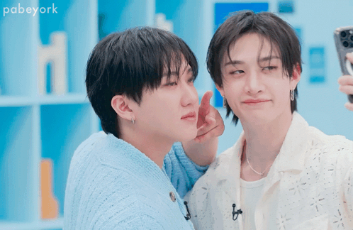 Two Young Men Are Taking A Selfie And The Words Pabeyork Are Visible In The Corner GIF