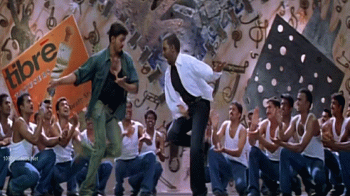 Two Young Men Dancing in Front of Mirror