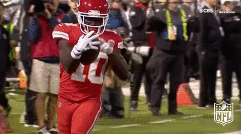 Tyreek Hill Calling Football GIF