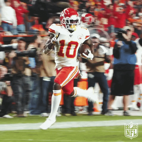 Tyreek Hill Running With Peace GIF