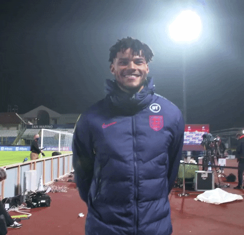 Tyrone Mings Footballer Smiling Walking Field GIF