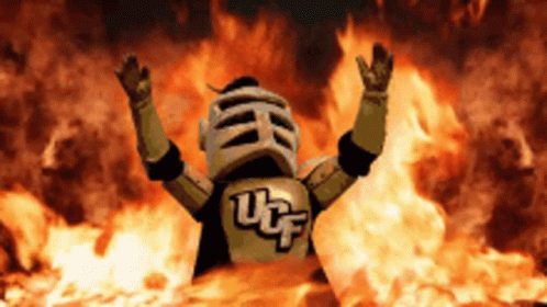 UCF Knight Mascot in Front of Fire
