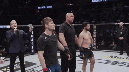 UFC Fighters in Boxing Ring With Referee