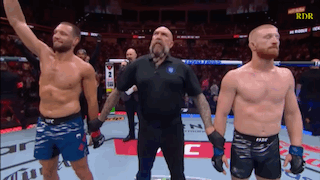 UFC Referee Between Two Fighters