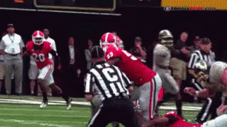 Uga Bulldogs Football Player Tackling Opponent GIF