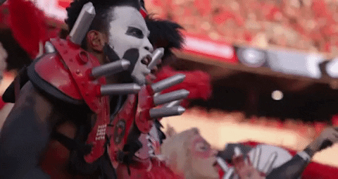 Uga Fan With Face Paint Cheering In Audience GIF