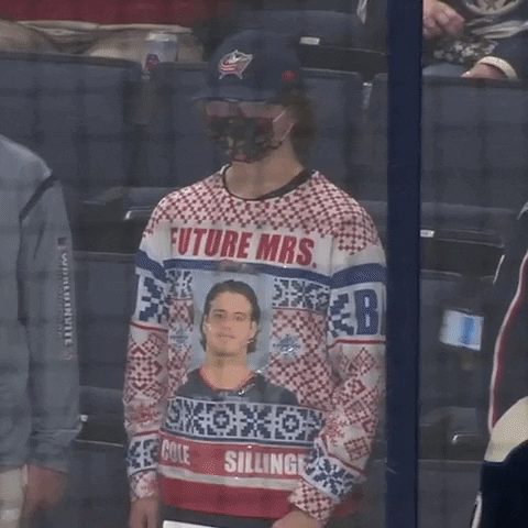Ugly Sweater With Wanted Man GIF