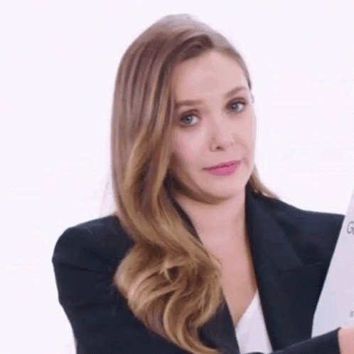 Unbothered Elizabeth Olsen Looks GIF