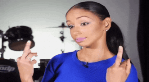 Unbothered Girl In Blue Shirt Raise Middle Finger GIF