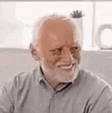Uncomfortable Smile Of Andras Arato GIF