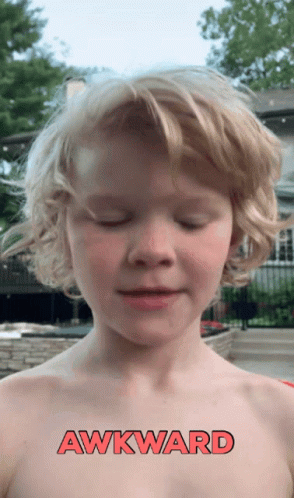 Awkward And Uncomfortable Face Look Of A Kid GIF