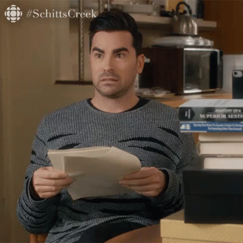 Uncomfortable Face Upon Reading Of David Rose GIF