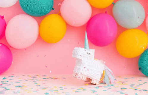 Unicorn Piñata With Balloons And Confetti GIF