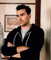 Unimpressed Guy Looking Around GIF
