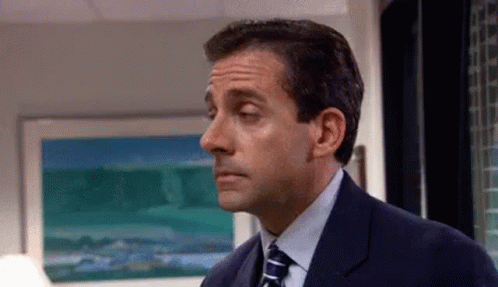 Unimpressed Michael Scott GIF
