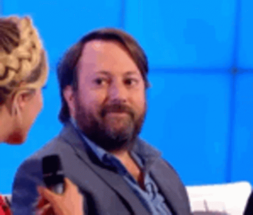 Unimpressed Guy In Talk Show GIF