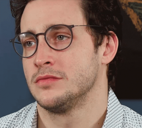 Unimpressed Guy Slow Blinking GIF