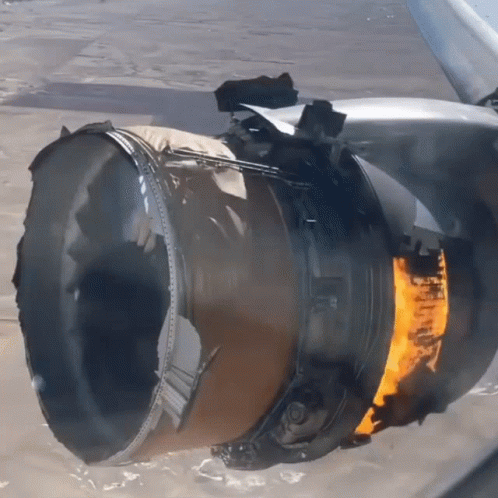 United Arlines Engine Burning Grounded Plane GIF