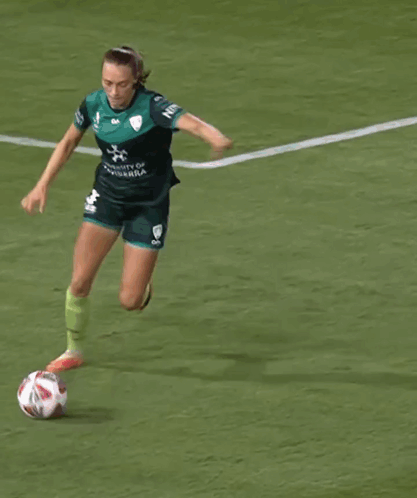 University of Canberra Woman Kicking Soccer Ball