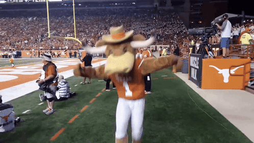 University of Texas Mascot Dancing on Field