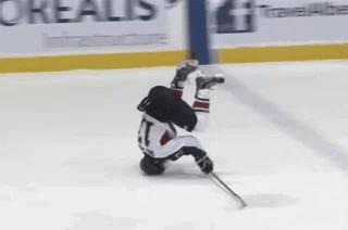 Upside Down Hockey Player on Ice