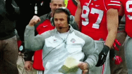 Urban Meyer Punch For Victory GIF