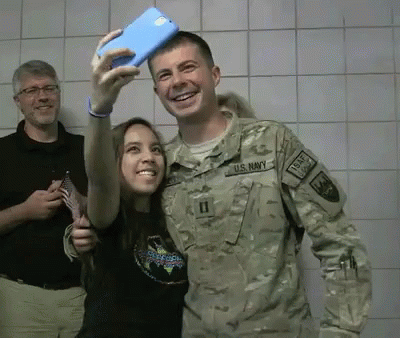 US Navy Man Taking Selfie With Woman GIF