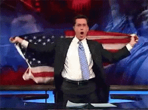 Energetic Stephen Colbert Dancing With Usa Flag GIF