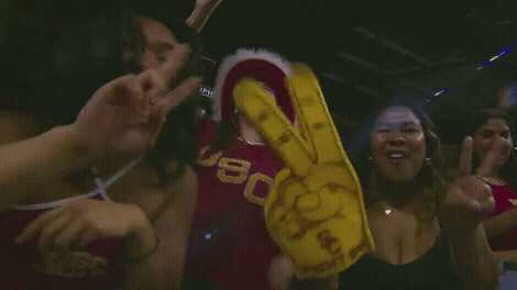 Usc Fan Wearing Cowboy Hat While Cheering GIF